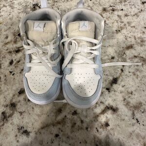 Jordan 1 Mid white and light blue with glittery swoosh